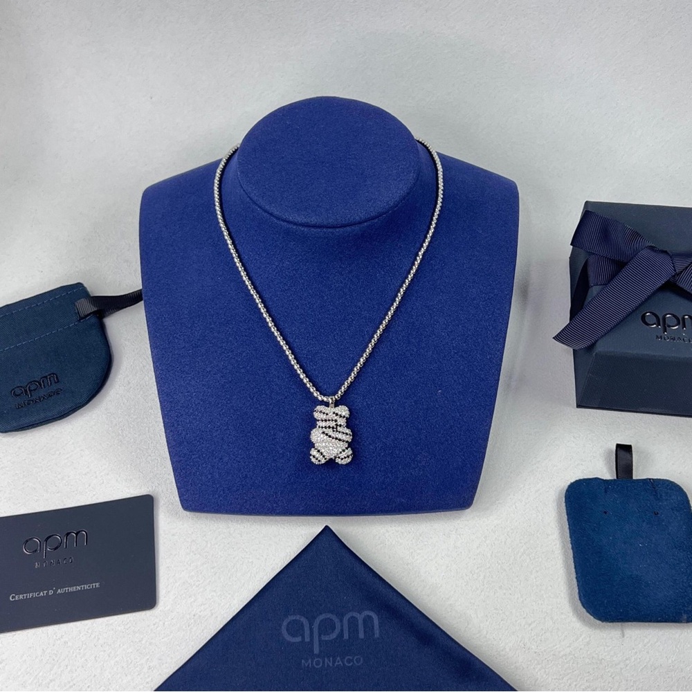 APM Monaco black and white striped double-sided bear necklace